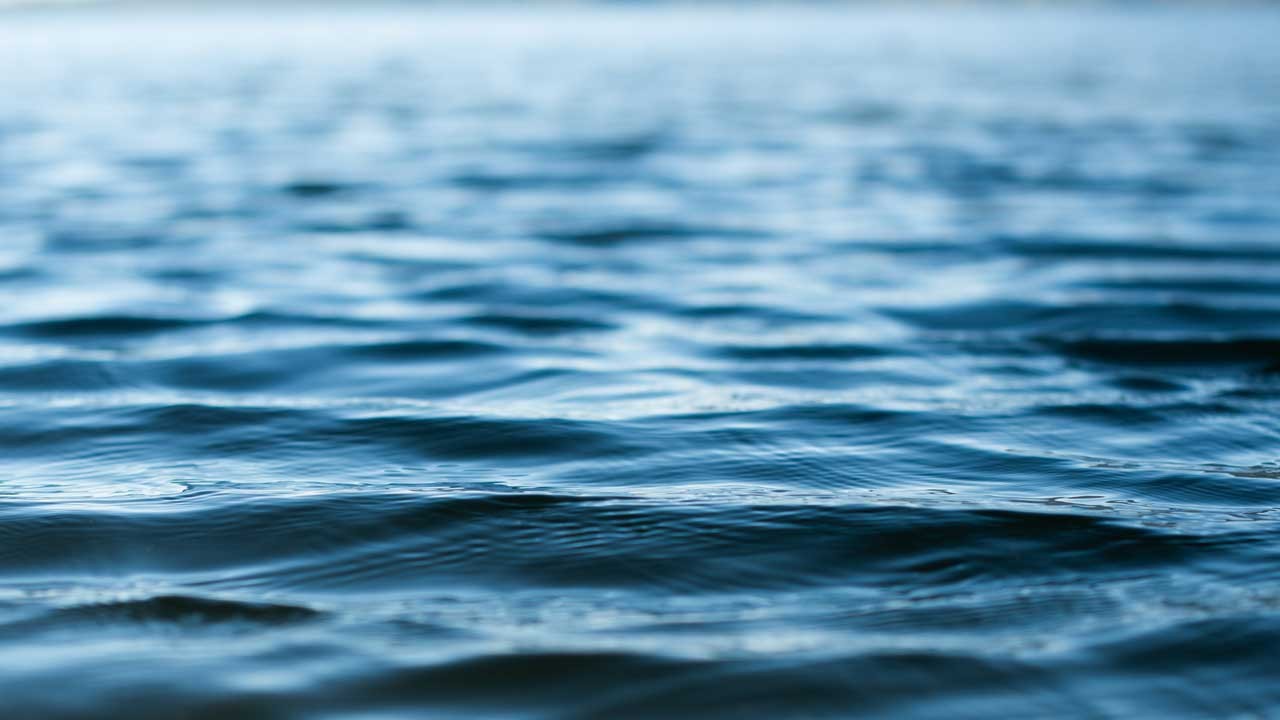 Waves on a blue lake